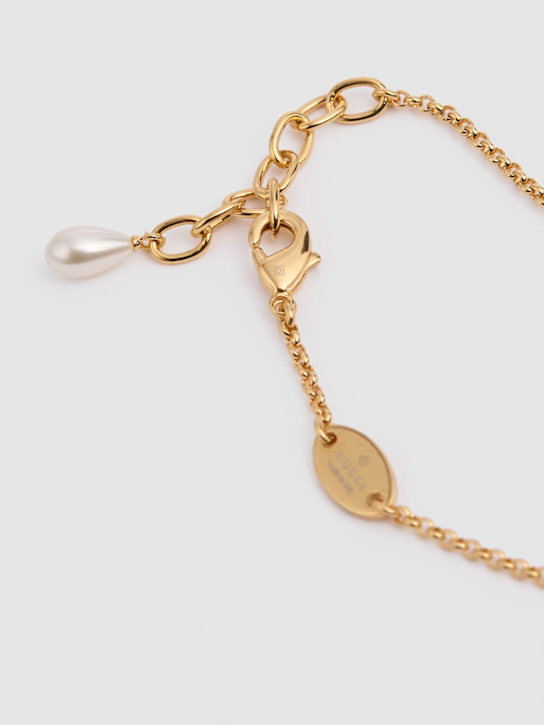 Luisaviaroma Bracciale a catena GG Marmont in ottone con charm Pezzi Unici