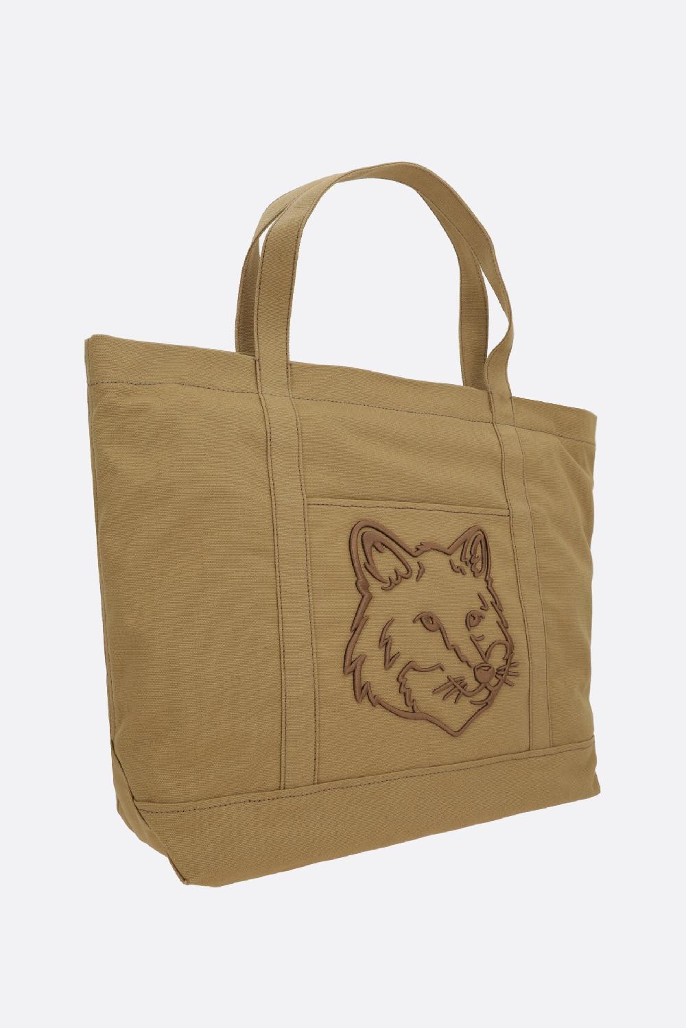 MAISON KITSUNÉ borsa tote Fox Head large in canvas Spedizione gratuita